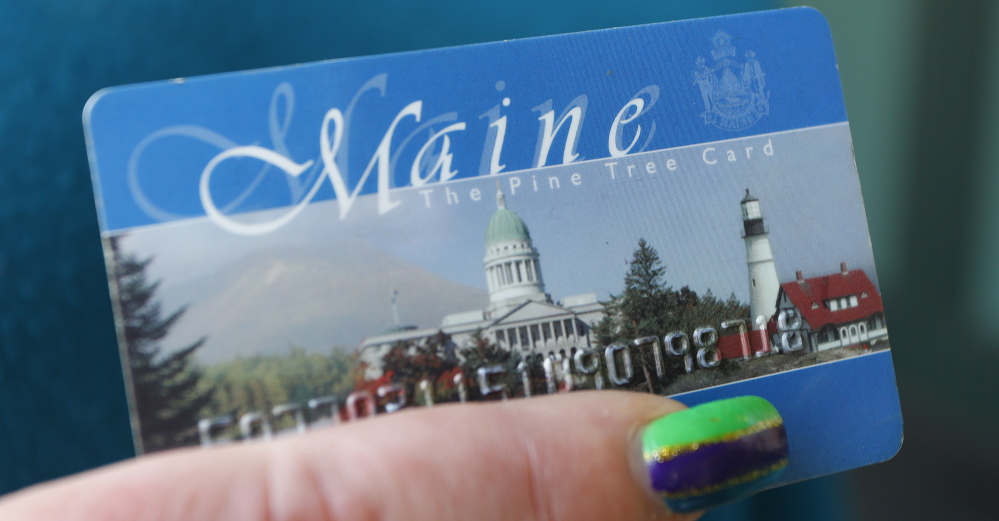 Maine officials and the federal government are at odds over the use of photos on the cards used to access food stamps and in-person interviews for those re-applying for food assistance.