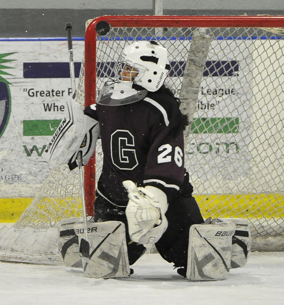 Greely goalie Nica Todd makes one of her 19 saves Wednesday in a 6-2 girls’ hockey win over Cape Elizabeth/Waynflete/South Portland at William B. Troubh Ice Arena in Portland.