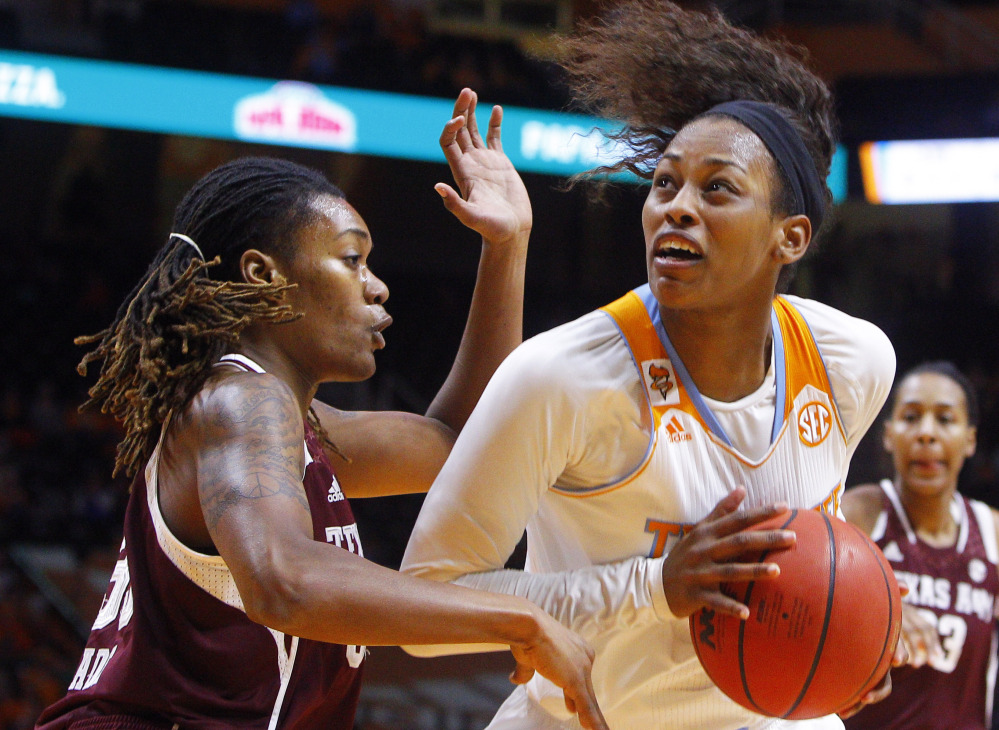 Tennessee’s Bashaara Graves works the ball against Texas A&M forward Achiri Ade in the first half  of Thursday’s game, won by the Volunteers.