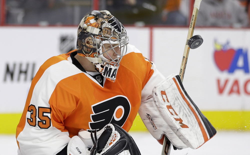 Philadelphia goalie Steve Mason blocks a shot during the first period of Thursday’s game against the Washington Capitals. Jakub Voracek scored in overtime to give the Flyers a 3-2 win.