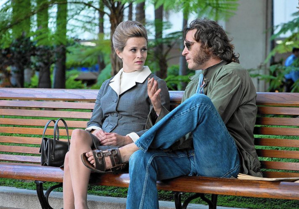 Reese Witherspoon as Penny Kimball and Joaquin Phoenix as Doc Sportello in “Inherent Vice.”