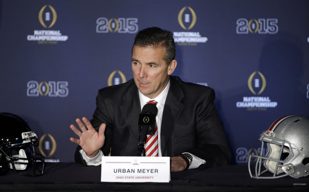 Ohio State Coach Urban Meyer speaks during a news conference before the NCAA college football playoff championship game on Sunday. Oregon plays Ohio State in the championship game on Monday.