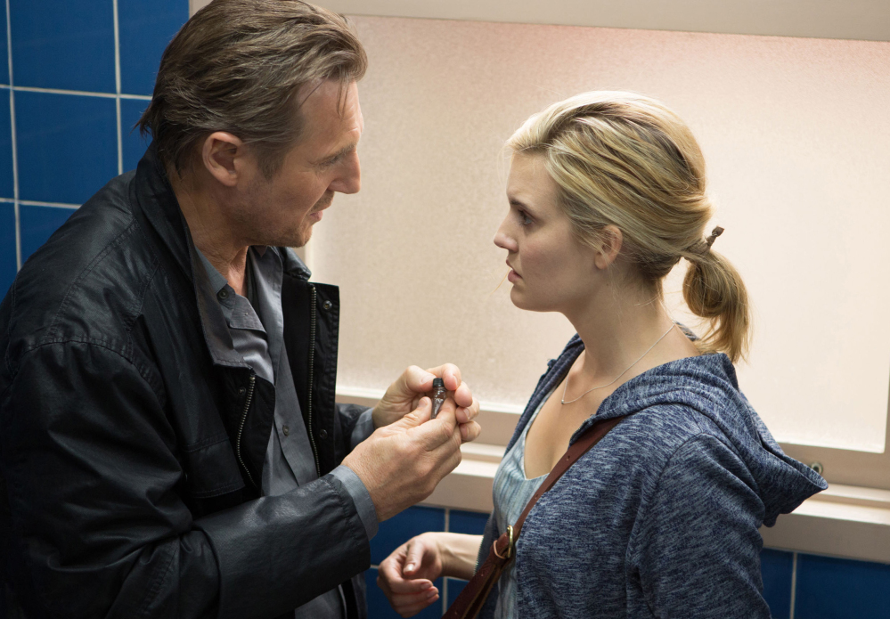 Liam Neeson, left, plays vengeful retired CIA agent Bryan Mills, and Maggie Grace plays Kim in “Taken 3.”
