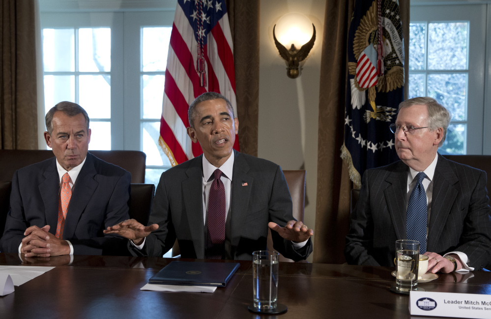 President Obama, flanked by House Speaker John Boehner of Ohio, left, and Senate Majority Leader Mitch McConnell of Ky., speaks to media on Tuesday before his meeting with the bipartisan, bicameral leadership of Congress to discuss wide-ranging issues.
