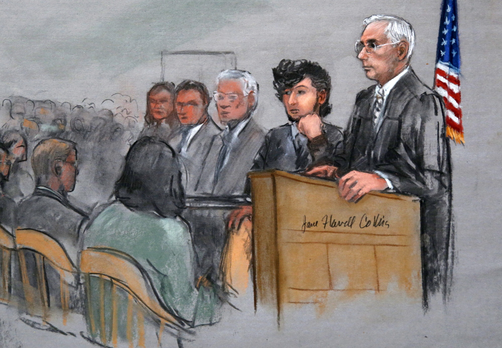 Bombing suspect Dzhokhar Tsarnaev, second from right, is depicted beside U.S. District Judge George O’Toole Jr., right, as O’Toole addresses a pool of potential jurors.