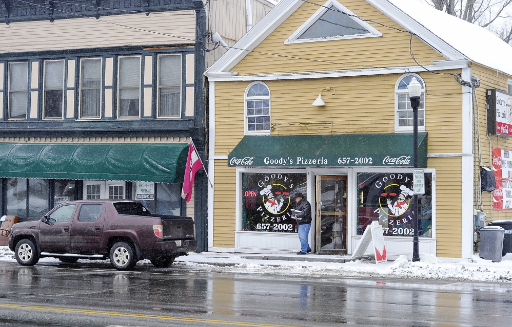 Richard Martin of Bridgton leaves Goody's Pizzeria in Gray, a town that lacks nonprofits, which will hurt the town's  tax base if the governor's idea to let towns tax nonprofits is approved.
Gordon Chibroski/Staff Photographer