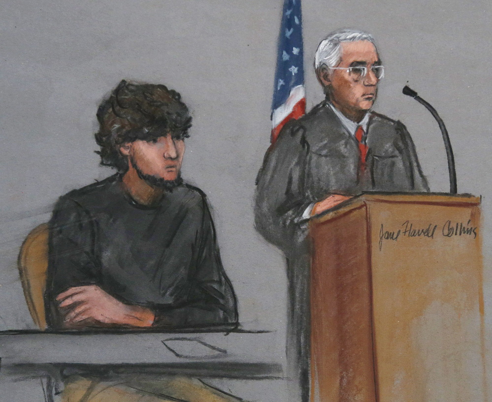 Boston Marathon bombing suspect Dzhokhar Tsarnaev, left, is depicted beside U.S. District Judge George O’Toole Jr., right, this month in a courtroom sketch.