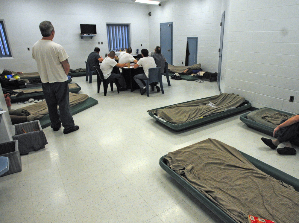 A classroom has been converted to housing with cots on the floor at the Kennebec County Jail in Augusta.