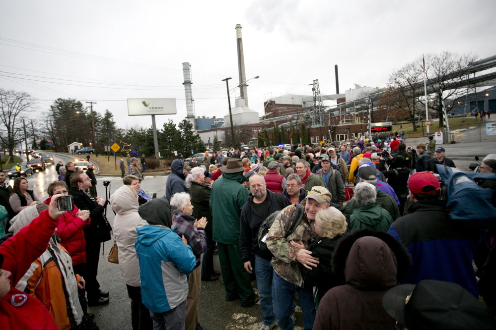 Hundreds of community members greet workers as they leave the Bucksport paper mill for the last time Dec. 17. In closing the 85-year-old mill, Verso Paper cited high energy costs and a shrinking market for the glossy paper that it produced for magazines and catalogs.