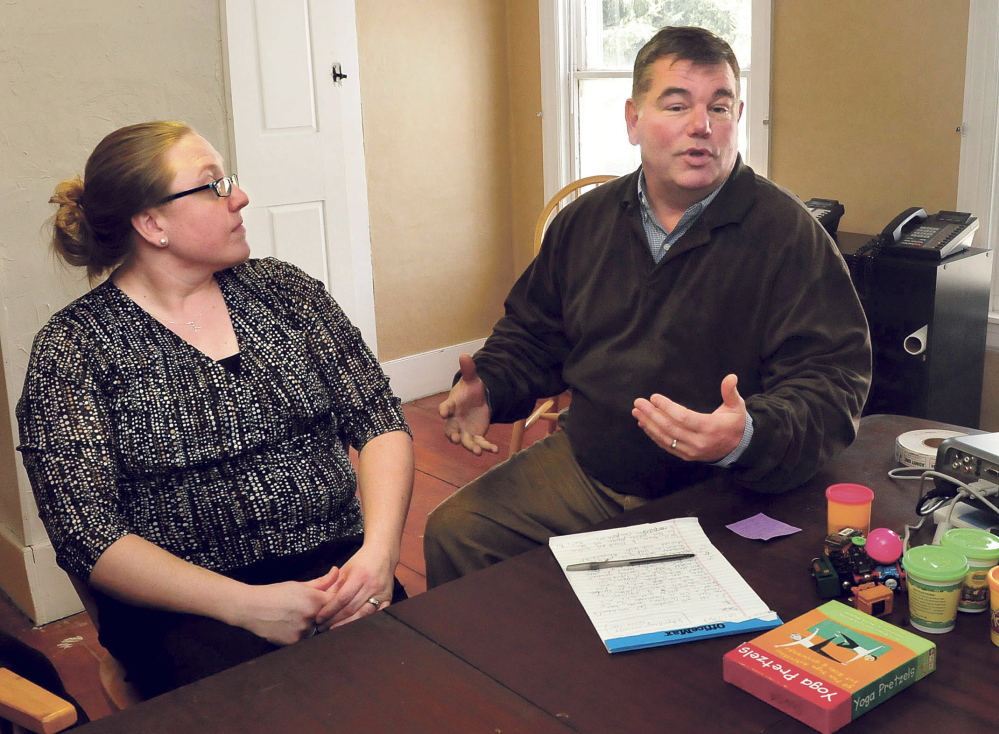 Children’s Center Executive Director Jeffrey Johnson, right, speaks about the new location in Skowhegan on Tuesday as Elisa Sousa, a site supervisor, listens.