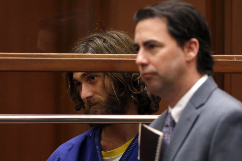 Colby Robert Kronholm, left, appears in court for his arraignment on a charge of murderiing a man in Hollywood, in Los Angeles, California, on Wednesday.