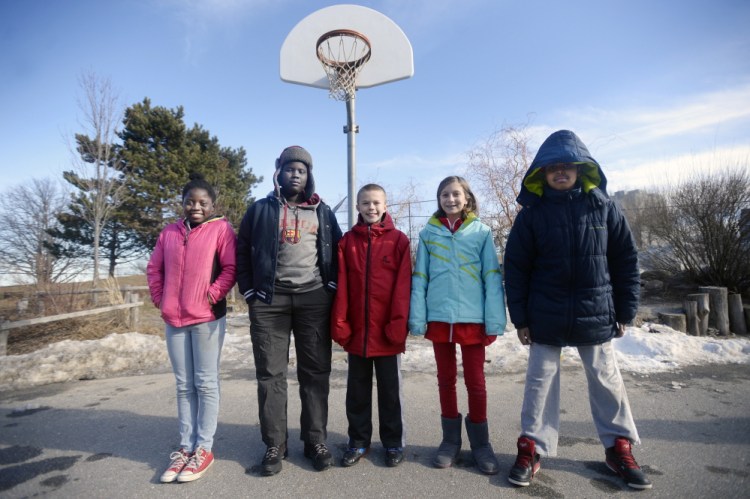 These fifth-graders at Portland’s East End Community School – from left, Lina Wakati, 11, William Lobor, 10, Tyler Hethcoat, 11, Shai Knight, 11, and Said Mohamud, 11 – weighed in Wednesday on the cheating controversy involving the use of under-inflated footballs by the New England Patriots. “Cheaters never win,” Lobor said, “so what’s the point in cheating if you’re not a winner on the inside?”