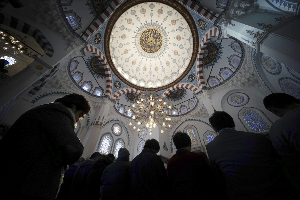 Muslims offer Friday prayers at Tokyo Camii, the largest mosque in Japan, in Tokyo, on Friday, the deadline for paying ransom for two Japanese hostages held by the Islamic State group.