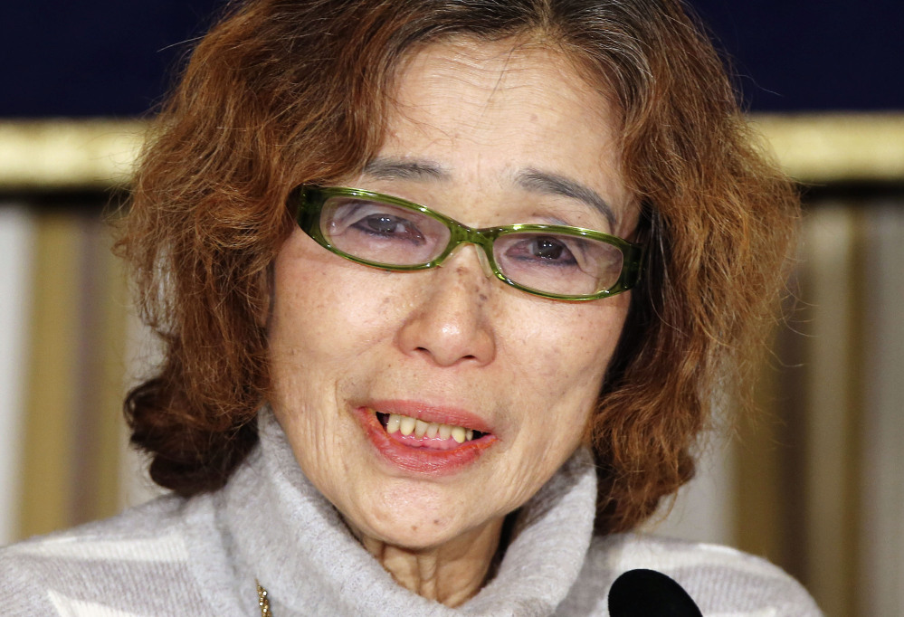 Junko Ishido, mother of Japanese journalist Kenji Goto who was taken hostage by the Islamic State group, appeals for her son’s release in Tokyo on Friday.