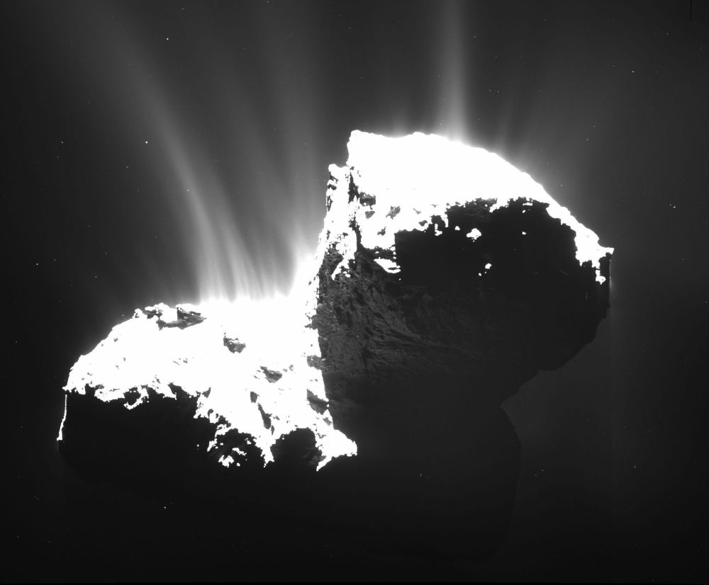 A photo taken from the Rosetta space probe 18.6 miles from Comet 67P/Churyumov-Gerasimenko in November reveals the faint jets of the comet’s activity.