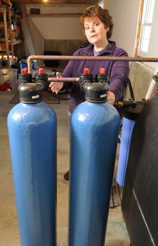 Andrea Brann of Manchester has a $3,300 water filtration system. Arsenic in well water can be a problem in parts of central and Down East Maine.