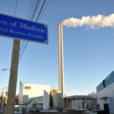 The Madison Paper Industries mill in Maine faces stiff competition from a mill in Canada that officials claim is unfairly subsidized.
