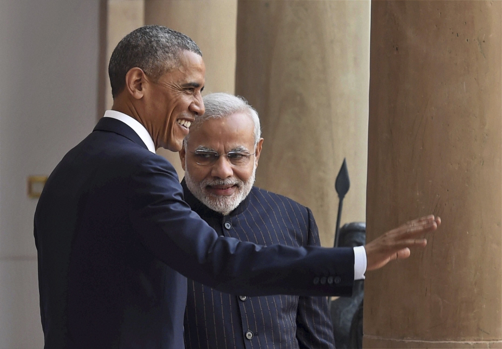U.S. President Barack Obama, left, and Indian Prime Minister Narendra Modi pose for the media before holding their talks, in New Delhi, India, on Sunday. Seizing on their personal bond, Obama and Modi said Sunday they had made progress on nuclear cooperation and climate change, with Obama declaring a “breakthrough understanding” in efforts to free U.S. investment in nuclear energy development in India.