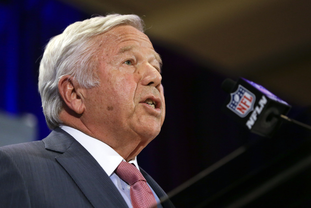 New England Patriots owner Robert Kraft speaks during a news conference Monday in Chandler, Ariz. He said that if the NFL “is not able to definitively determine that our organization tampered with the air pressure in the footballs, I would expect and hope the league would apologize to our entire team.”