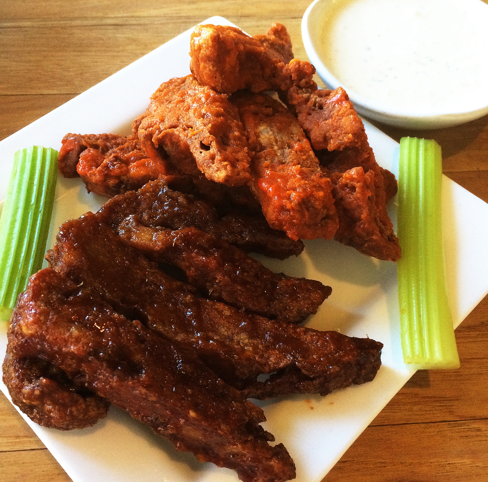 Seitan wings and sauce is a favorite Super Bowl recipe at the South Portland home of photographer Patrick Jones.