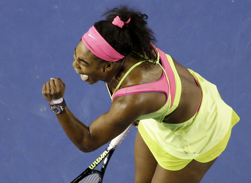 Serena Williams celebrates after winning a point against Maria Sharapova during the women’s singles final at the Australian Open on Saturday.