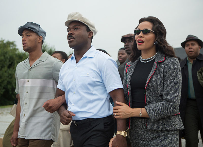 David Oyelowo, center, as Martin Luther King, Jr. and Carmen Ejogo, right, as Coretta Scott King on the march in Selma.