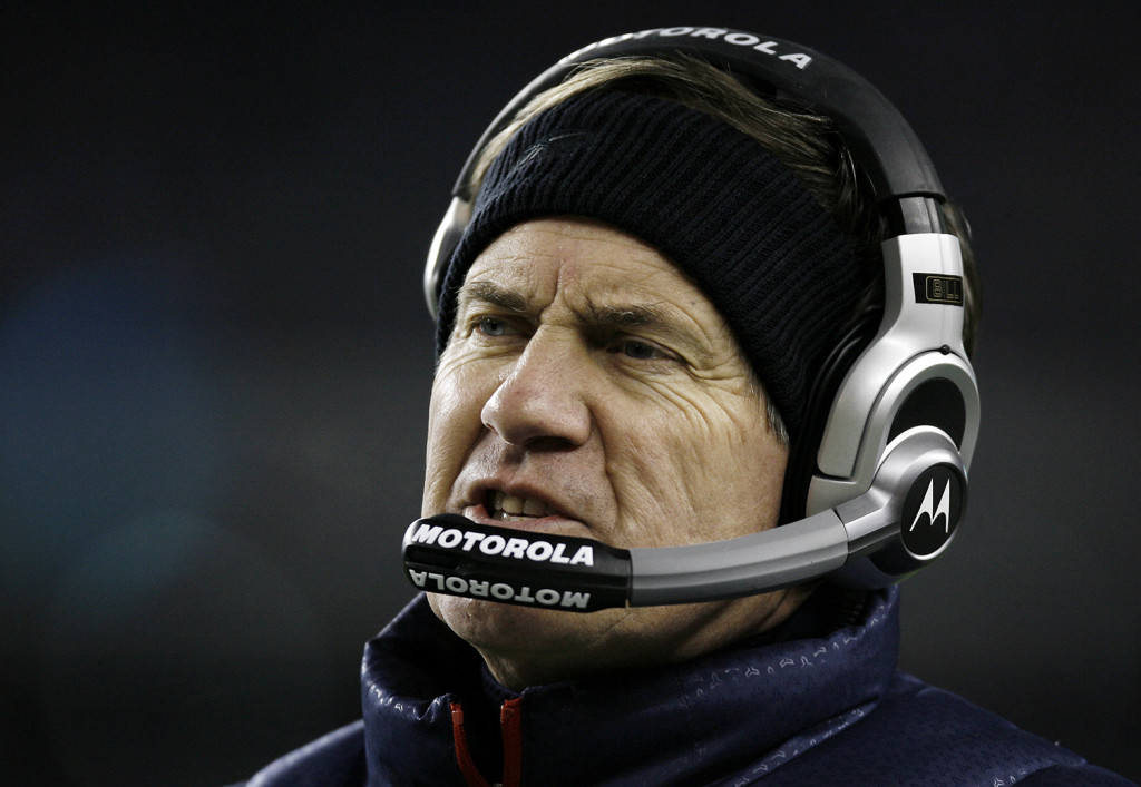 New England Patriots head coach Bill Belichick talks on his head set during their football game against the Pittsburgh Steelers at Gillette Stadium in Foxborough, Mass. Sunday, Dec. 9, 2007. The Associated Press