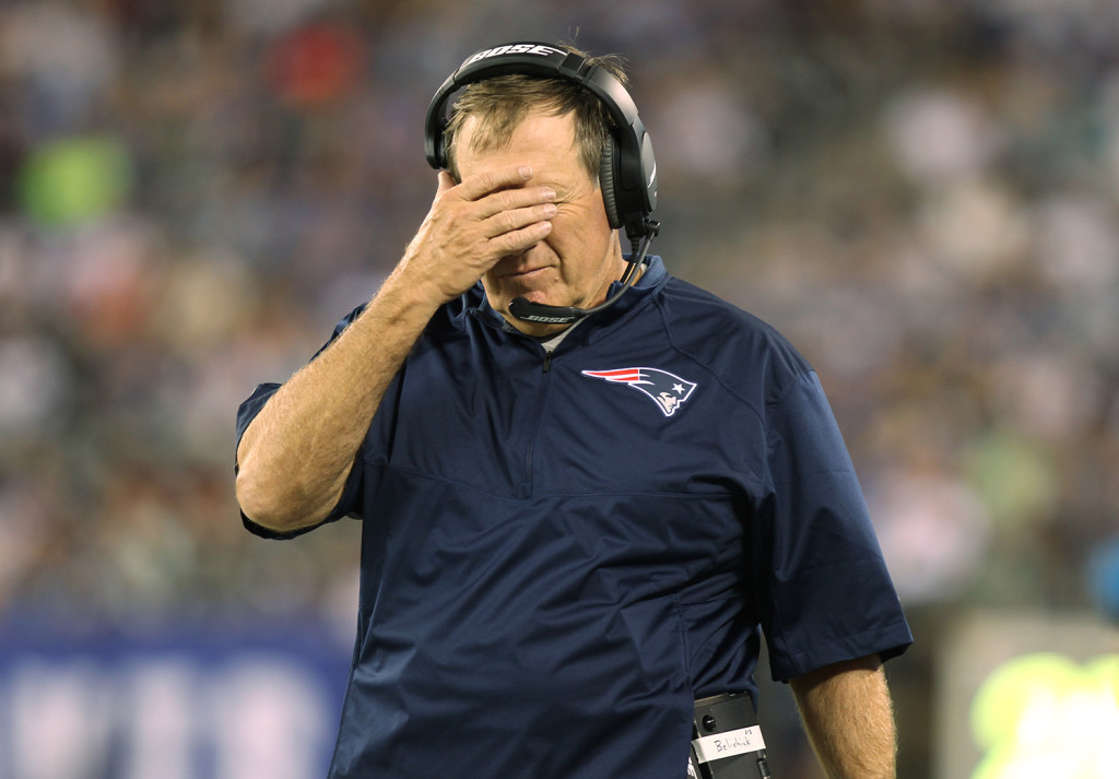 New England Patriots head coach Bill Belichick watches his team play the New York Giants in a preseason football game in East Rutherford, N.J. on Thursday, Aug. 28, 2014. The Associated Press