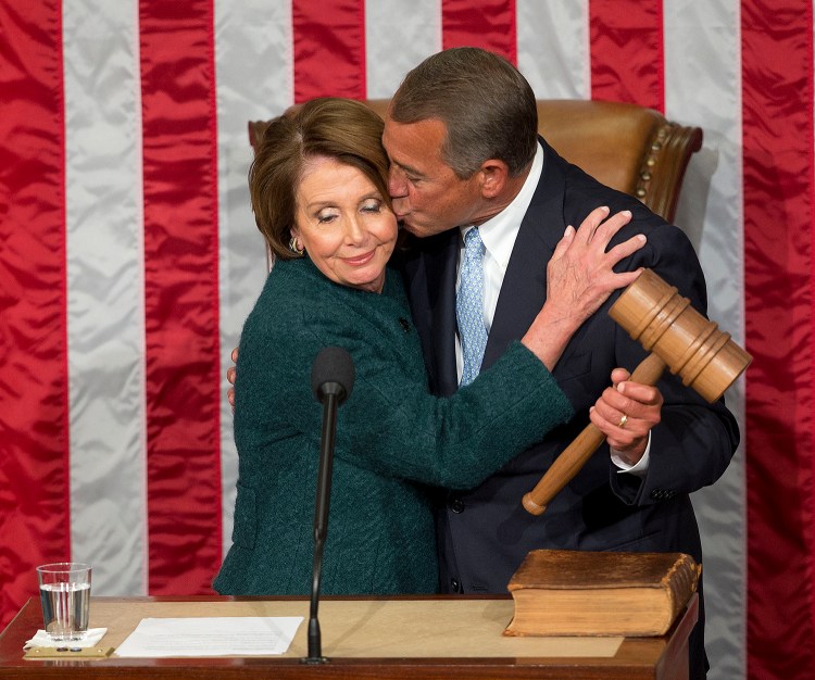 kisses House Minority Leader Nancy Pelosi of Calif. after being re-elected to a third term during the opening session of the 114th Congress, as Republicans assume full control for the first time in eight years, Tuesday, Jan. 6, 2015. The Associated Press