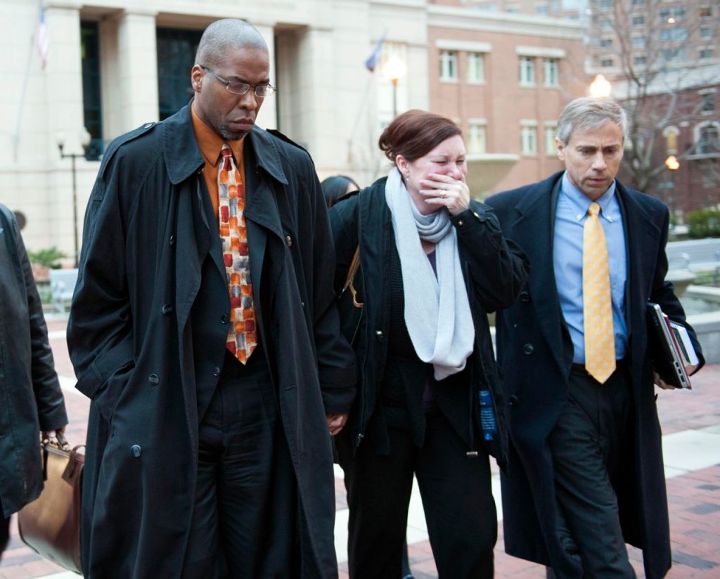 Former CIA officer Jeffrey Sterling, left, leaves the Alexandria Federal Courthouse Monday in Alexandria, Va., with his wife, Holly, and attorney Barry Pollack, after being convicted on all nine counts he faced of leaking classified details of an operation to thwart Iran's nuclear ambitions to a New York Times reporter. The Associated Press