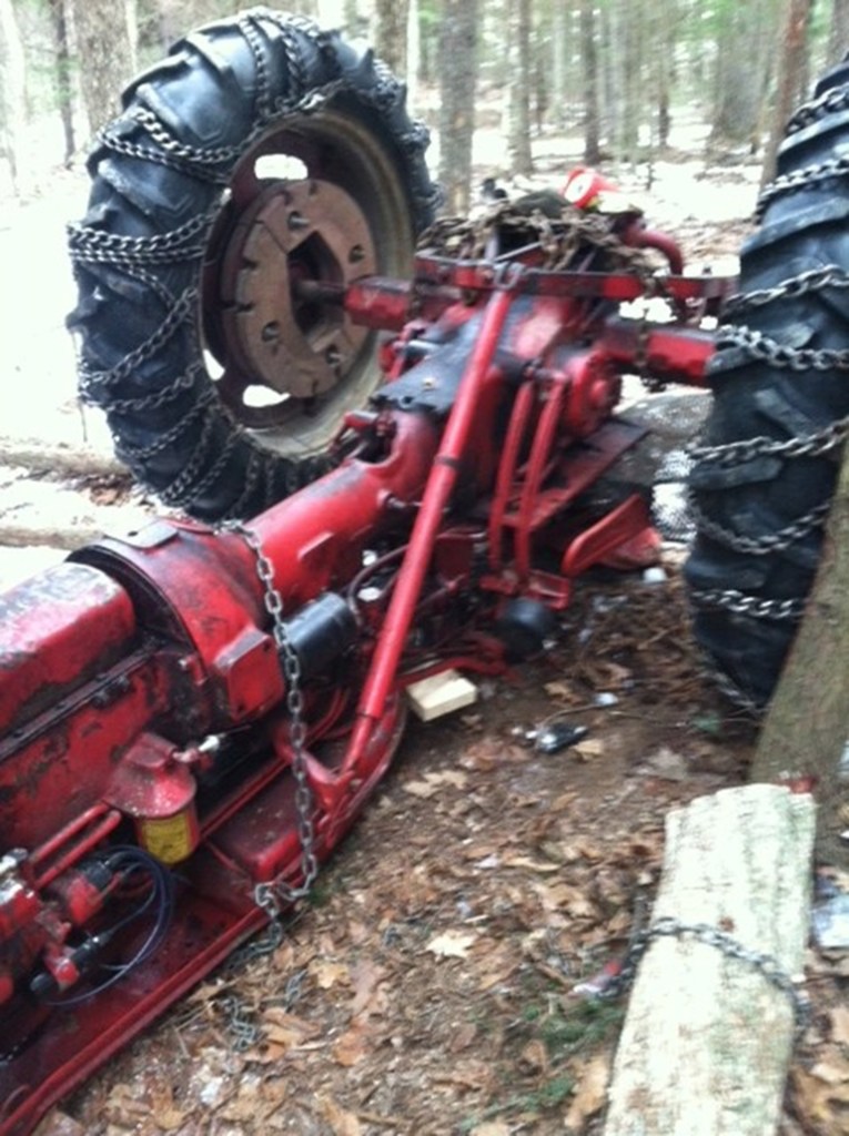 It took two hours to free a Greene man after he became trapped when this tractor overturned in Greene on Saturday.
