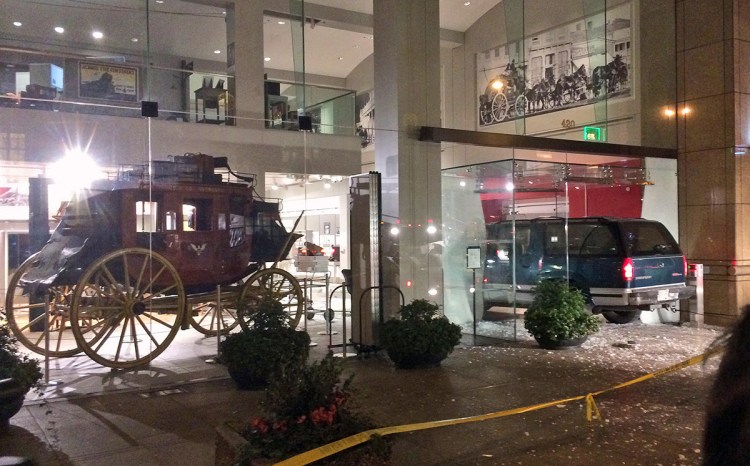 Thieves left the Chevrolet Suburban after driving it through a window of the Wells Fargo History Museum in downtown San Francisco. The Associated Press