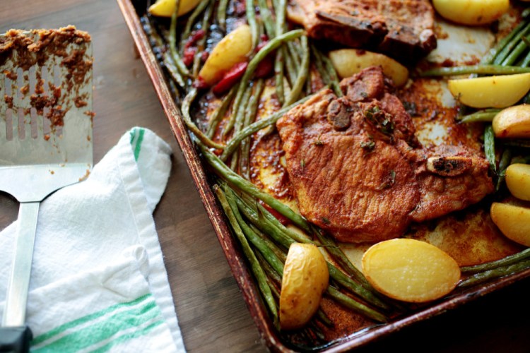 Roasted Pork Chops with Green Beans and Potatoes takes 25 minutes to cook.