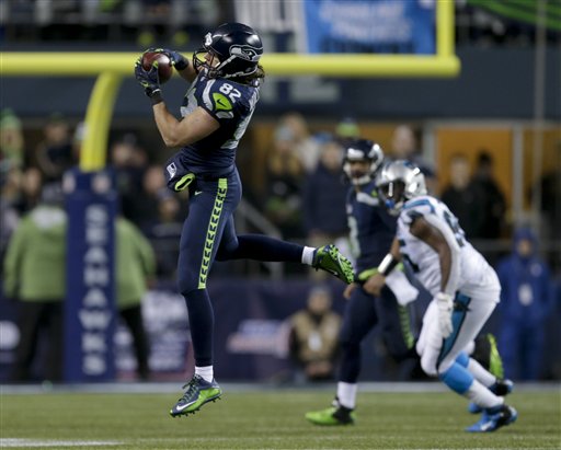 Seattle Seahawks tight end Luke Willson catches a pass against the Carolina Panthers in the second half in Seattle on Saturday. The Associated Press