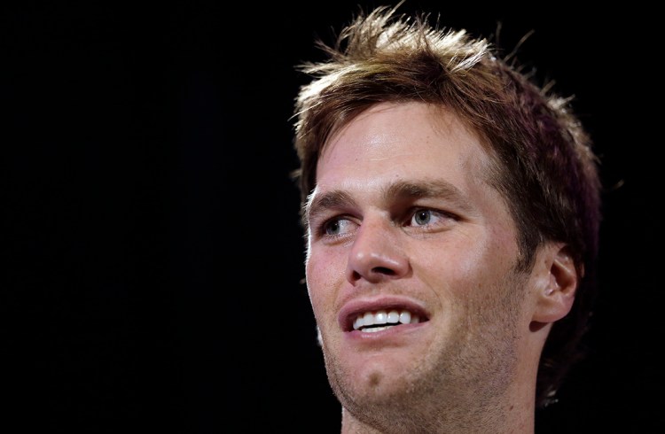 New England Patriots quarterback Tom Brady answers questions during a news conference Thursday in Chandler, Ariz. The Patriots play the Seattle Seahawks in Super Bowl XLIX Sunday. The Associated Press