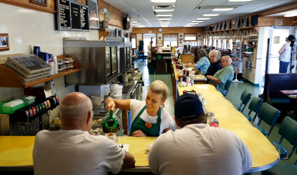 A waitress pours coffee for customers at Moody's Diner in Waldoboro in this May 2013 photo. Gabe Souza/Staff Photographer