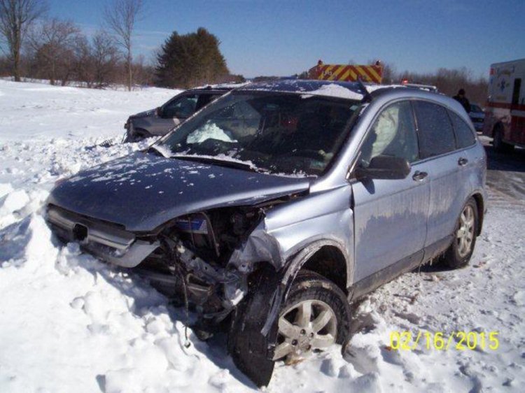 Two people from this Honda CRV were treated at Central Maine Medical Center in Lewiston following a four-vehicle crash on the Maine Turnpike Monday morning. Photo contributed by Trooper Bill Baker
