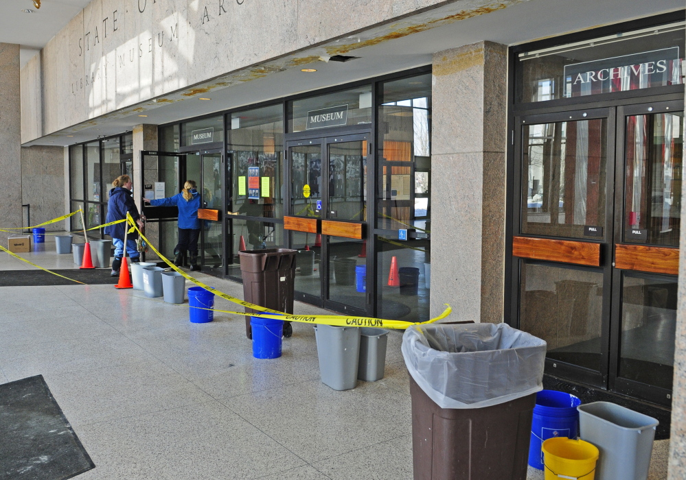 Visitors to the state library, museum and archives will see buckets and trash cans strategically placed to catch drips from the leaking ceiling in the Maine State Cultural Building lobby in Augusta.