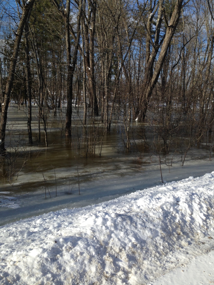 Flooding attributed to an ice jam on the Kennebec River, near its confluence with the Carrabassett River, is seen in this Jan. 28 photo. Experts are worried that ice jams and a rapid melting of this winter’s significant snowpack could result in flooding in the spring.
