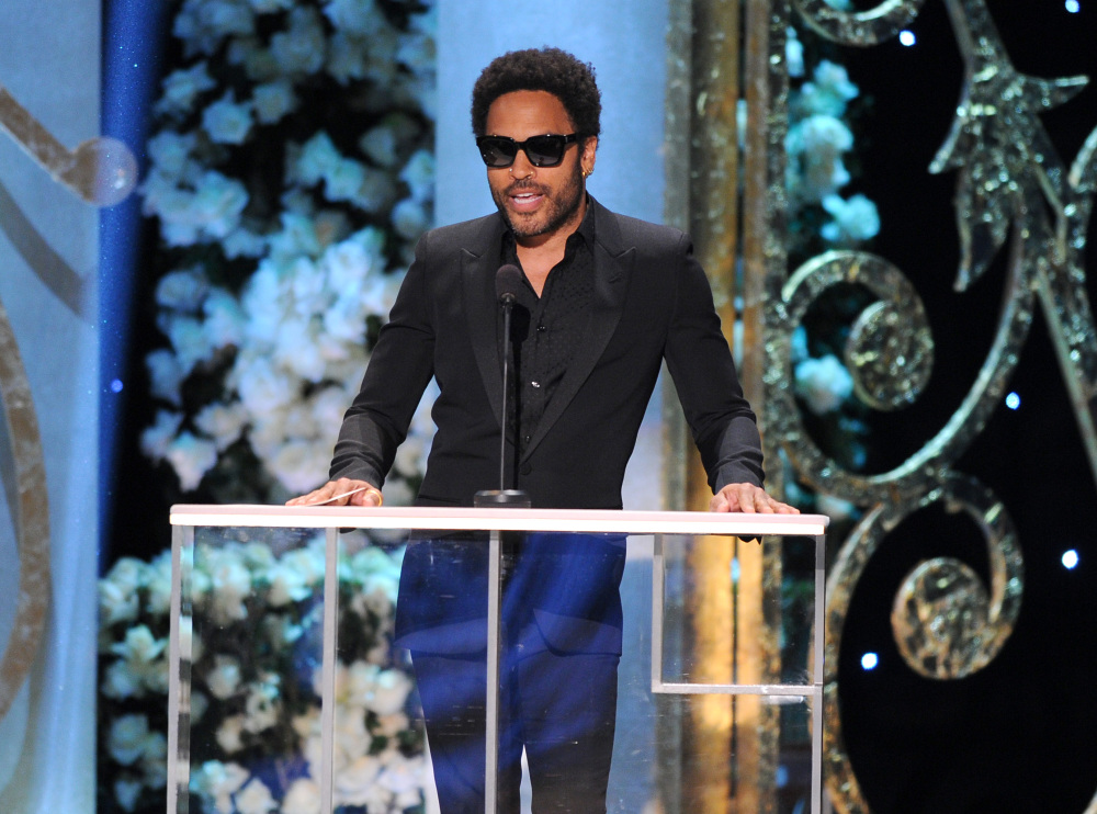 Lenny Kravitz presents the award for outstanding ensemble in a comedy series on stage at the 21st annual Screen Actors Guild Awards at the Shrine Auditorium on Jan. 25 in Los Angeles.  The Associated Press