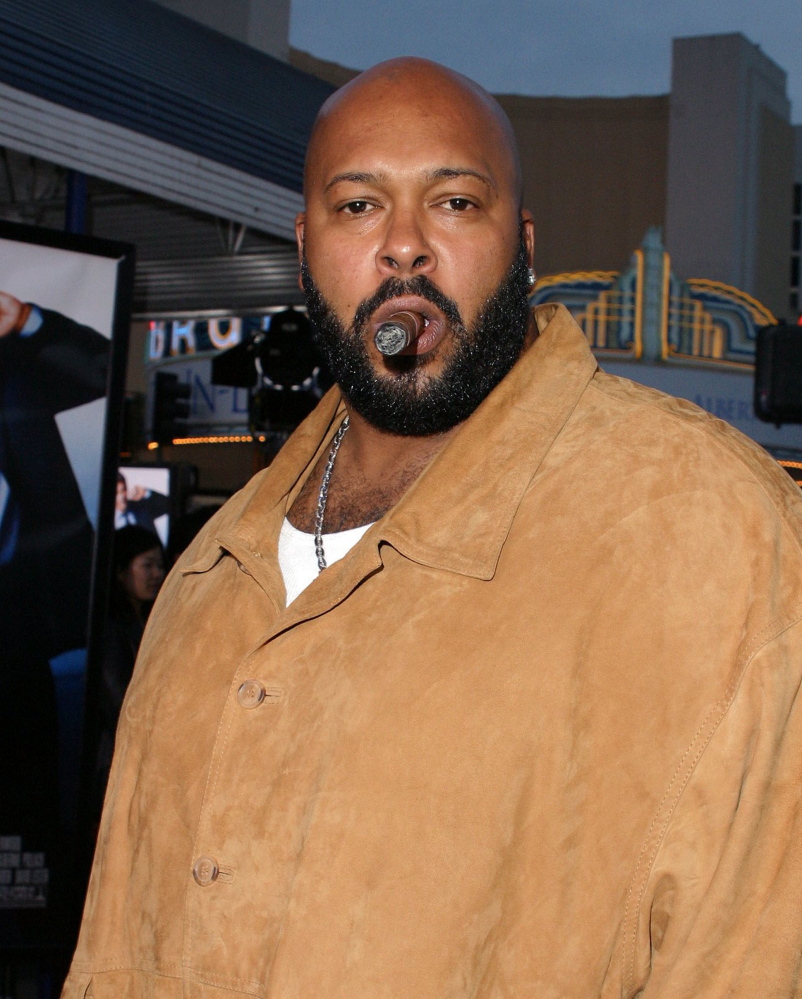 Suge Knight is being held on $2 million bail as investigators examine video of a deadly incident outside a restaurant.