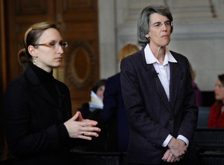 Attorney Holly Lusk, left, argued on behalf of Gov. Paul LePage and attorney Phyllis Gardiner represented Attorney General Janet Mills before the Maine Supreme Judicial Court on Thursday.