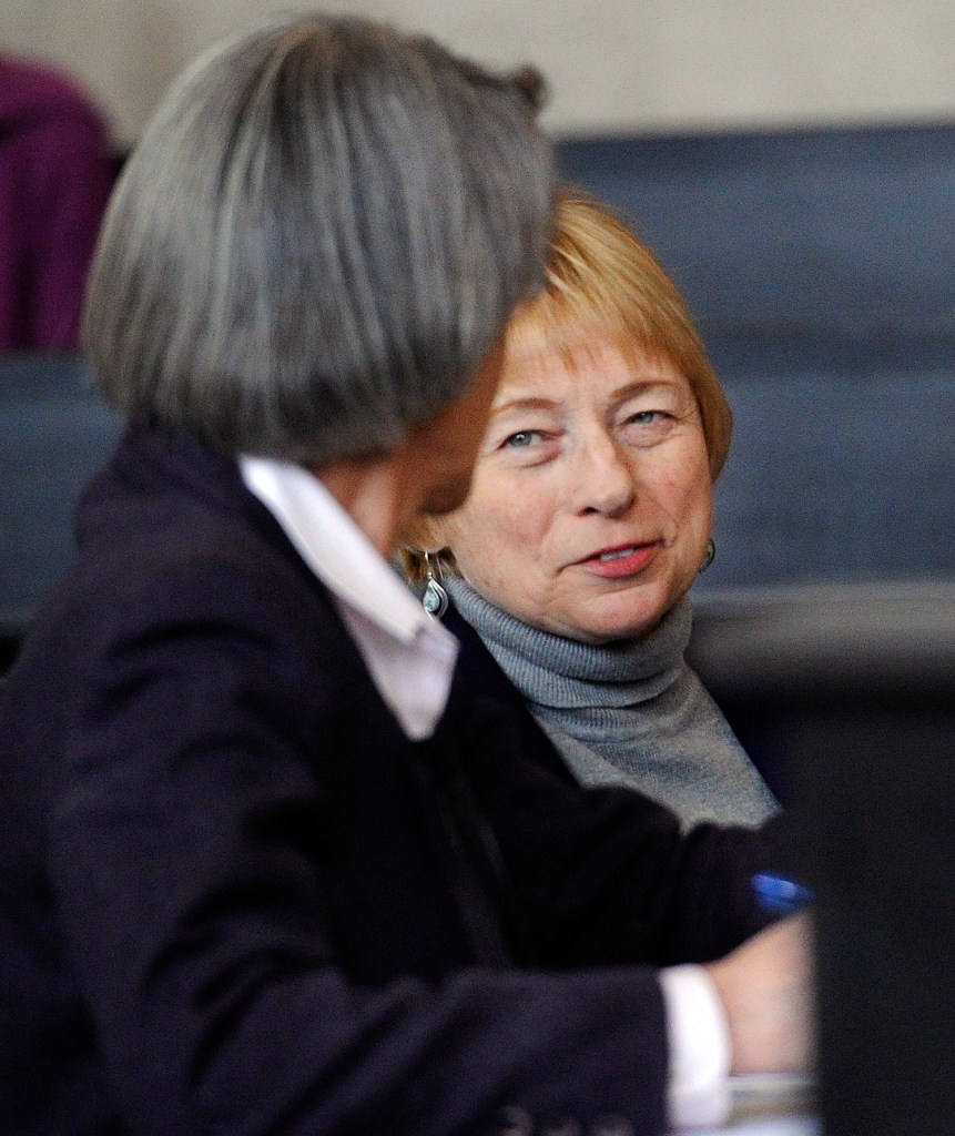 Attorney General Janet Mills talks with attorney Phyllis Gardiner at the Maine Supreme Judicial Court on Thursday.