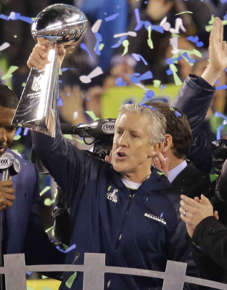 Seattle Seahawks Coach Pete Carroll took the time to hold up the Lombardi Trophy after his team won the Super Bowl last season, then wasted no time beginning the planning process for a repeat. Sunday night, he and his team look to do it again.