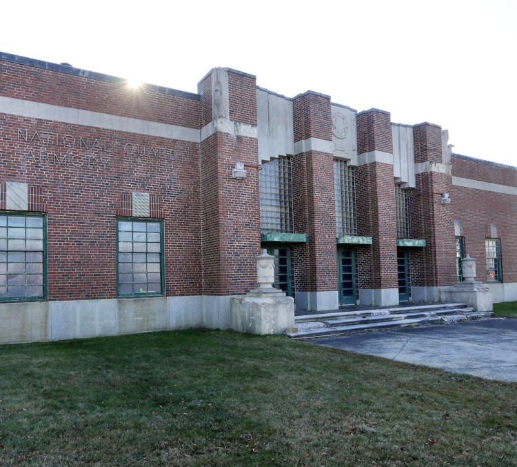 The former National Guard armory at the foot of the Casco Bay Bridge would be redeveloped into a gas station, convenience store, cafe, professional office space, community meeting space and a tourist information bureau. 2014 Press Herald file photo/Derek Davis