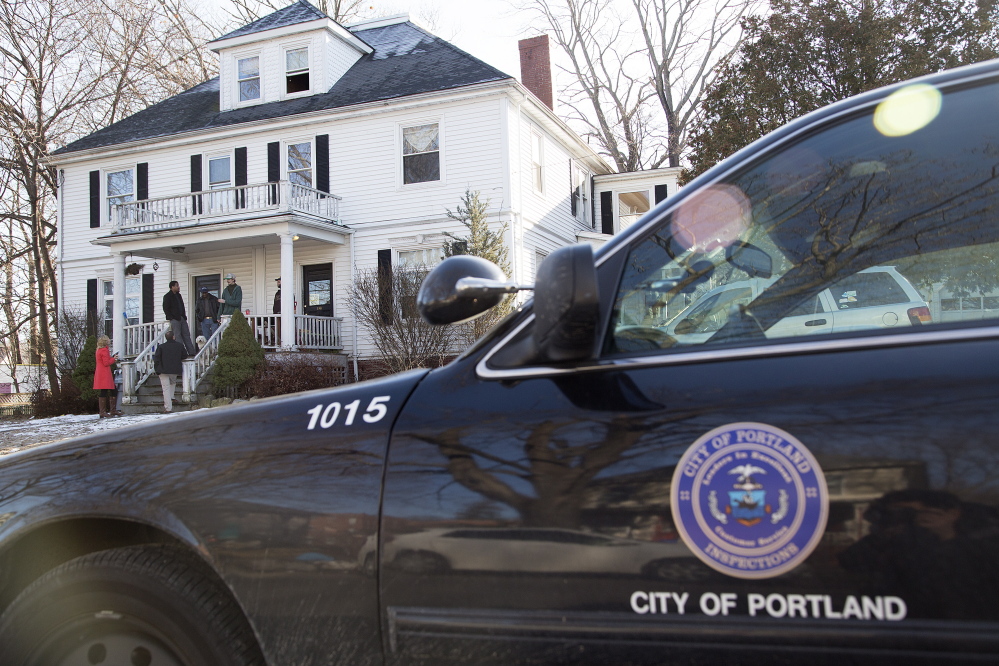 A city of Portland inspectors’ vehicle is parked outside 186-188 Dartmouth St. Code violations were found during a Jan. 20 inspection.