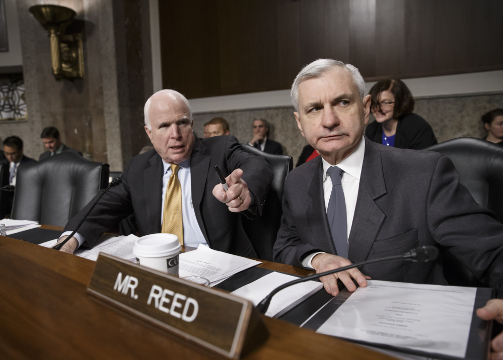 Senate Armed Services Committee Chairman Sen. John McCain, R-Ariz., left, and Sen. Jack Reed, D-R.I., lead the confirmation hearing for Ashton Carter on Wednesday.