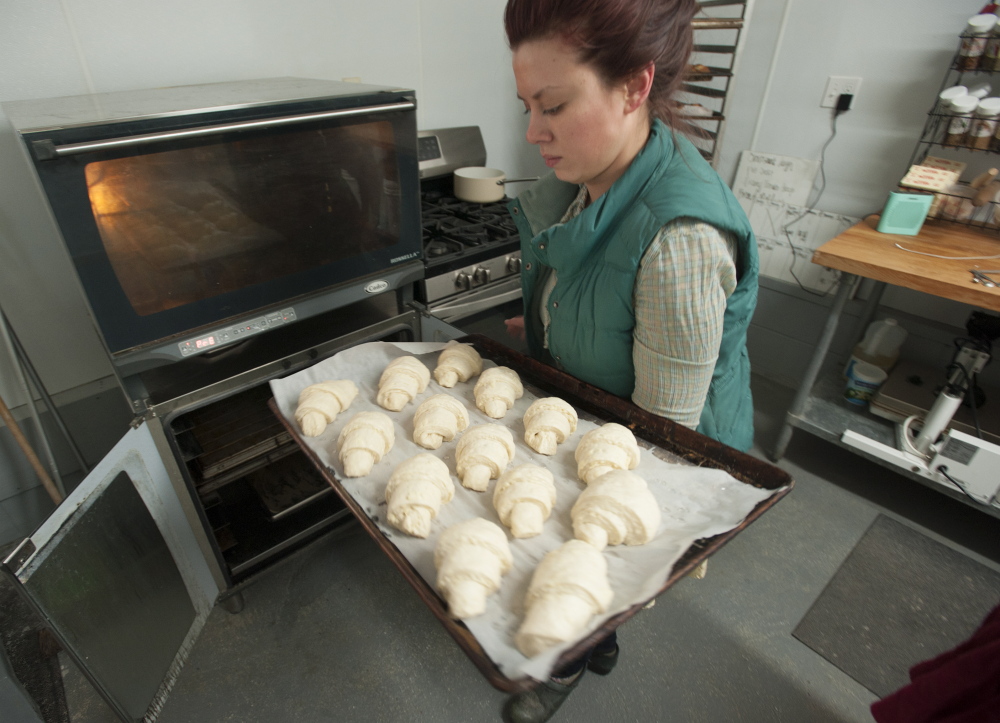Natasha Colbry sells the breads and pastries she bakes at the farm both online and in local markets. The Colbrys, like other farmers, need reliable Internet connections to do business.