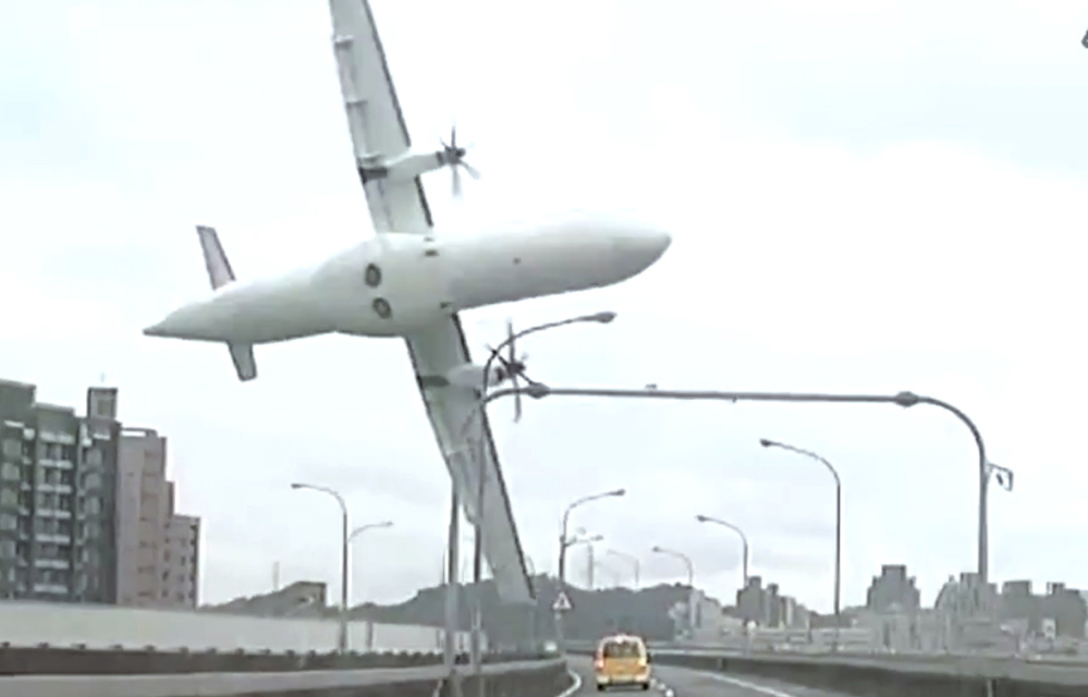 This image from video shows TransAsia Airways Flight 235 moments before it crashed Wednesday in Taipei, Taiwan.
