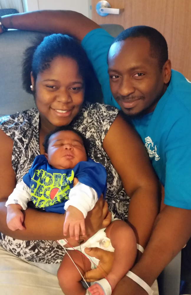 Avery, the heaviest baby ever delivered at St. Joseph’s Women’s Hospital in Tampa, is shown with his parents.